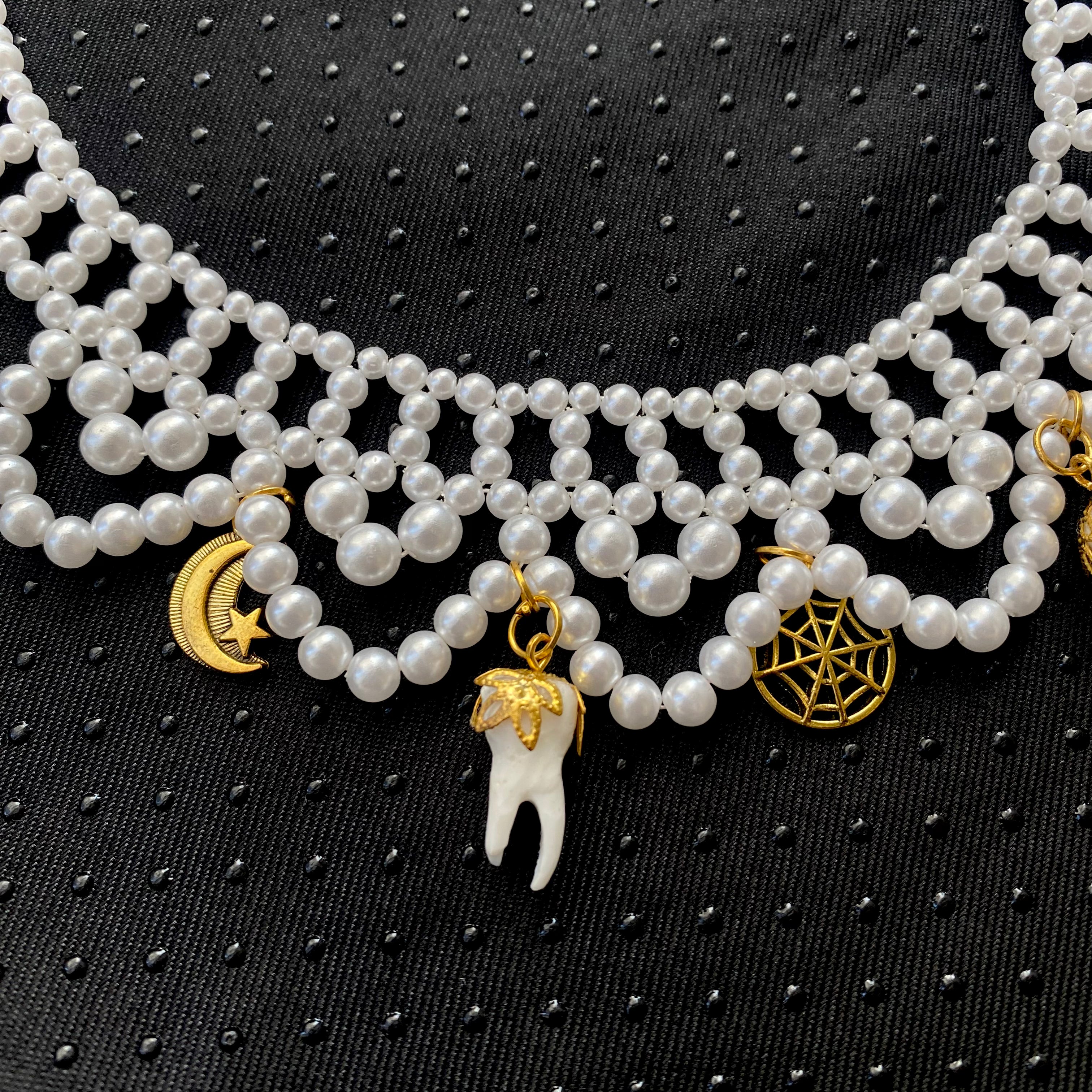 Pearl Necklace With Charms and Teeth